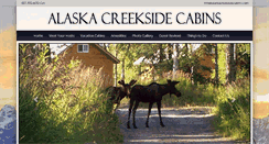 Desktop Screenshot of alaskacreeksidecabins.com